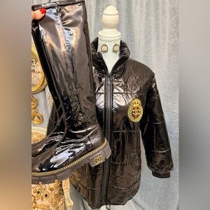Black Patent Puffer Jacket with Crest Emblem and Boots